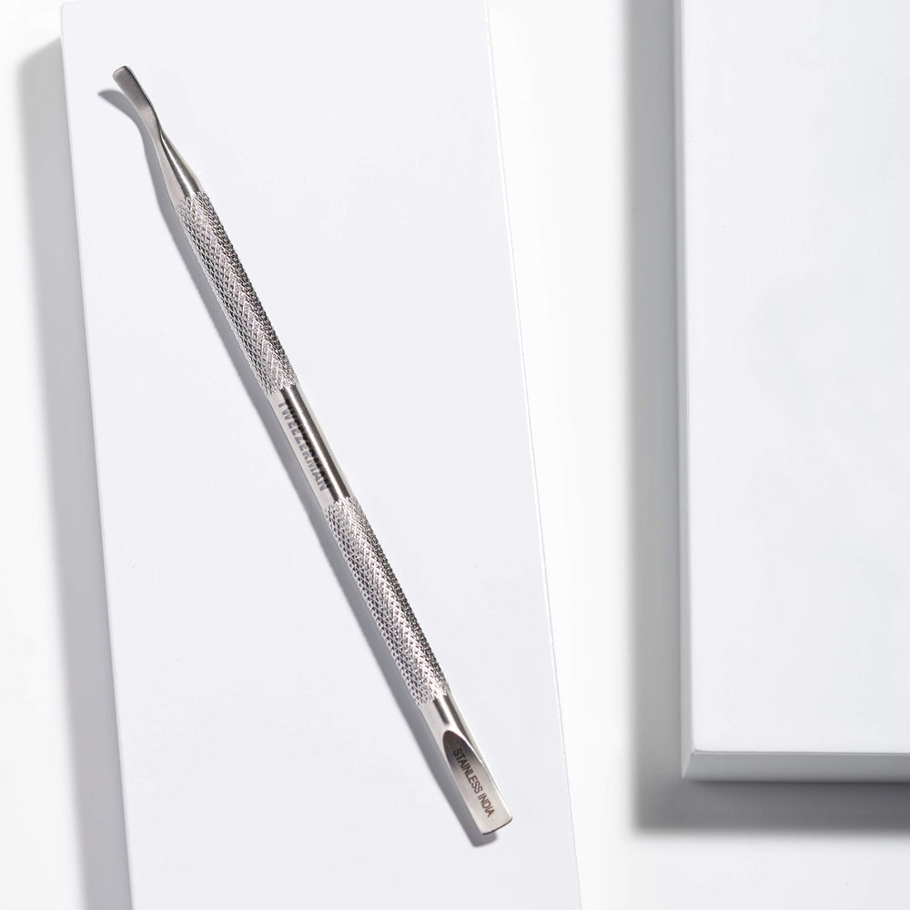Tweezerman Pushy curved pusher closeup enabling gentle cuticle shaping