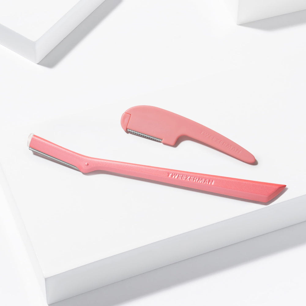 Tweezerman razor used on cheek to remove peach fuzz and smooth skin