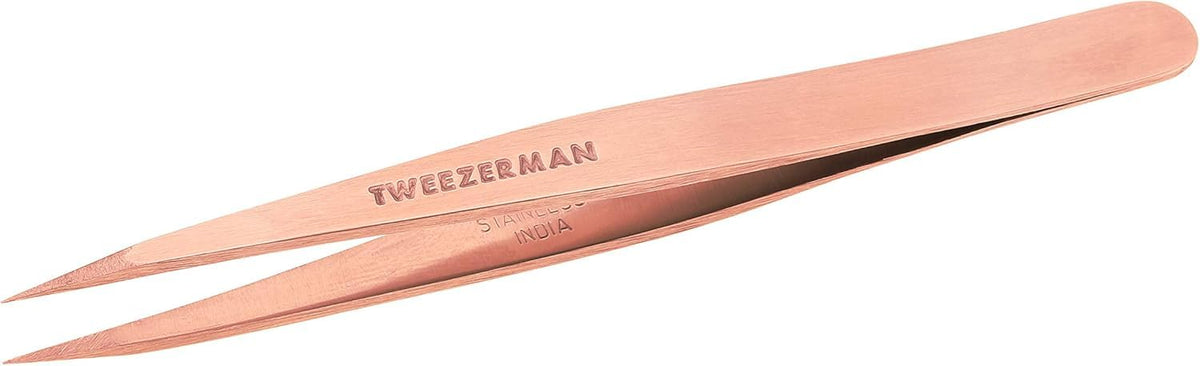 Tweezerman rose gold point tweezer front view showing sleek finish and precise shape