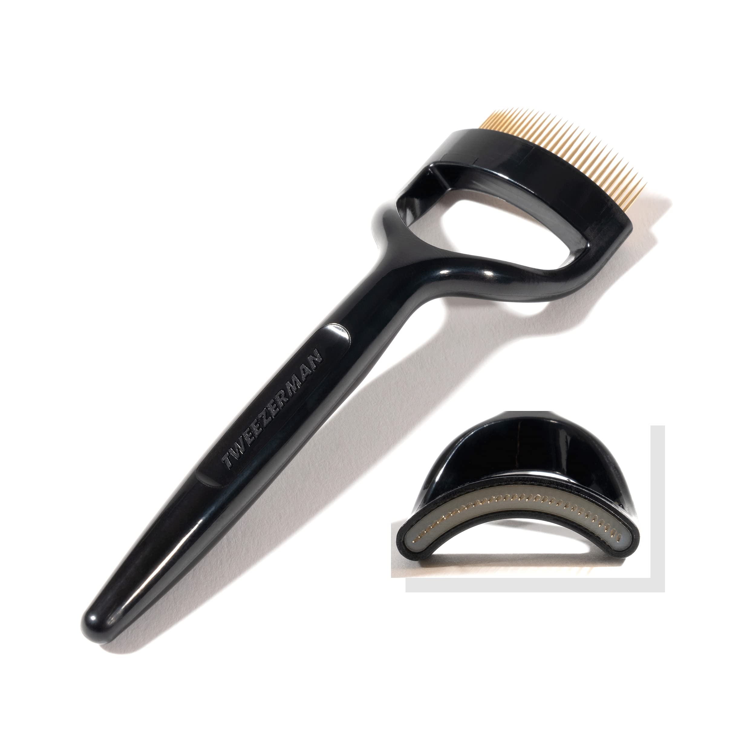 Tweezerman comb used on model separating wet mascara for clump-free lashes