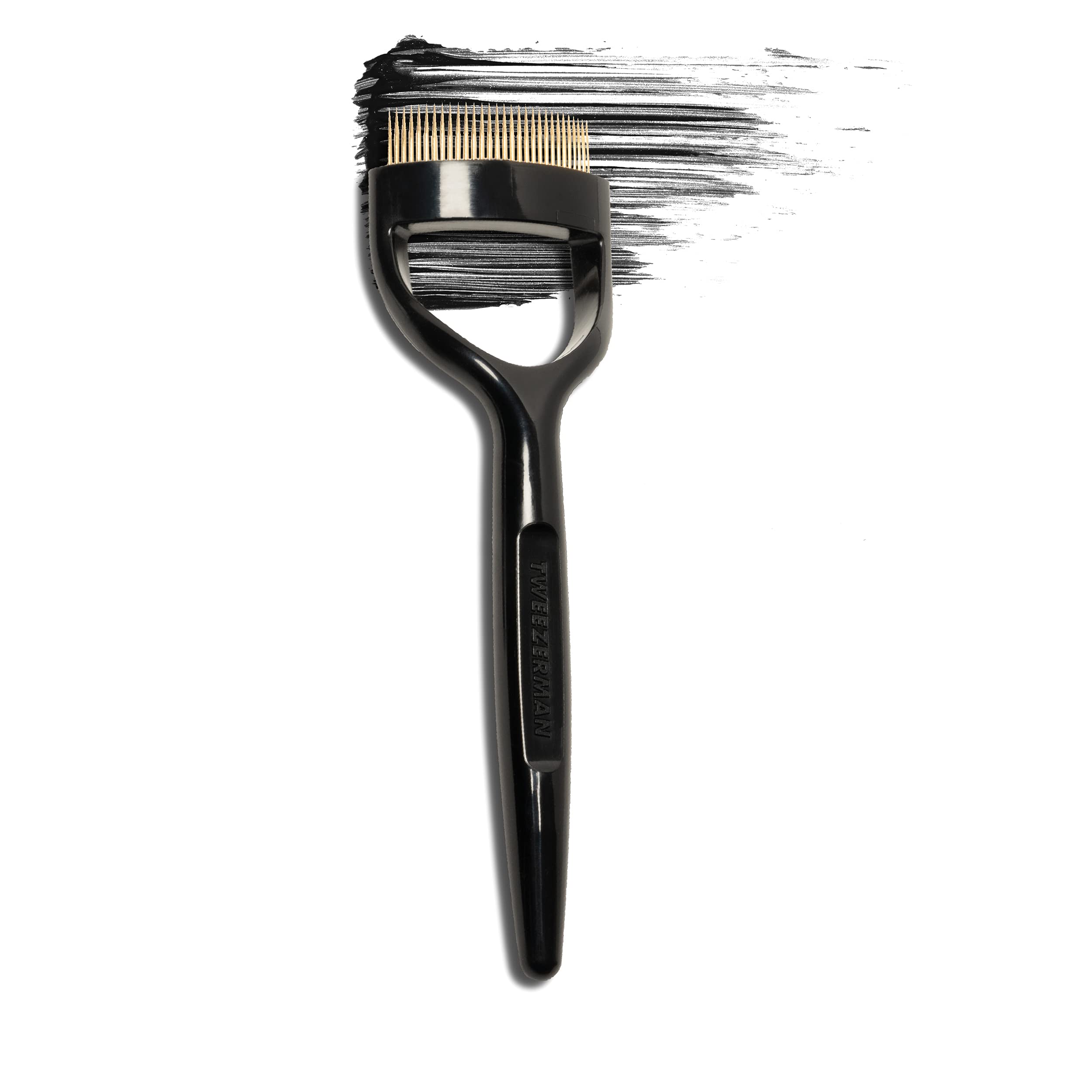 Tweezerman comb blending natural and false lashes for seamless finish
