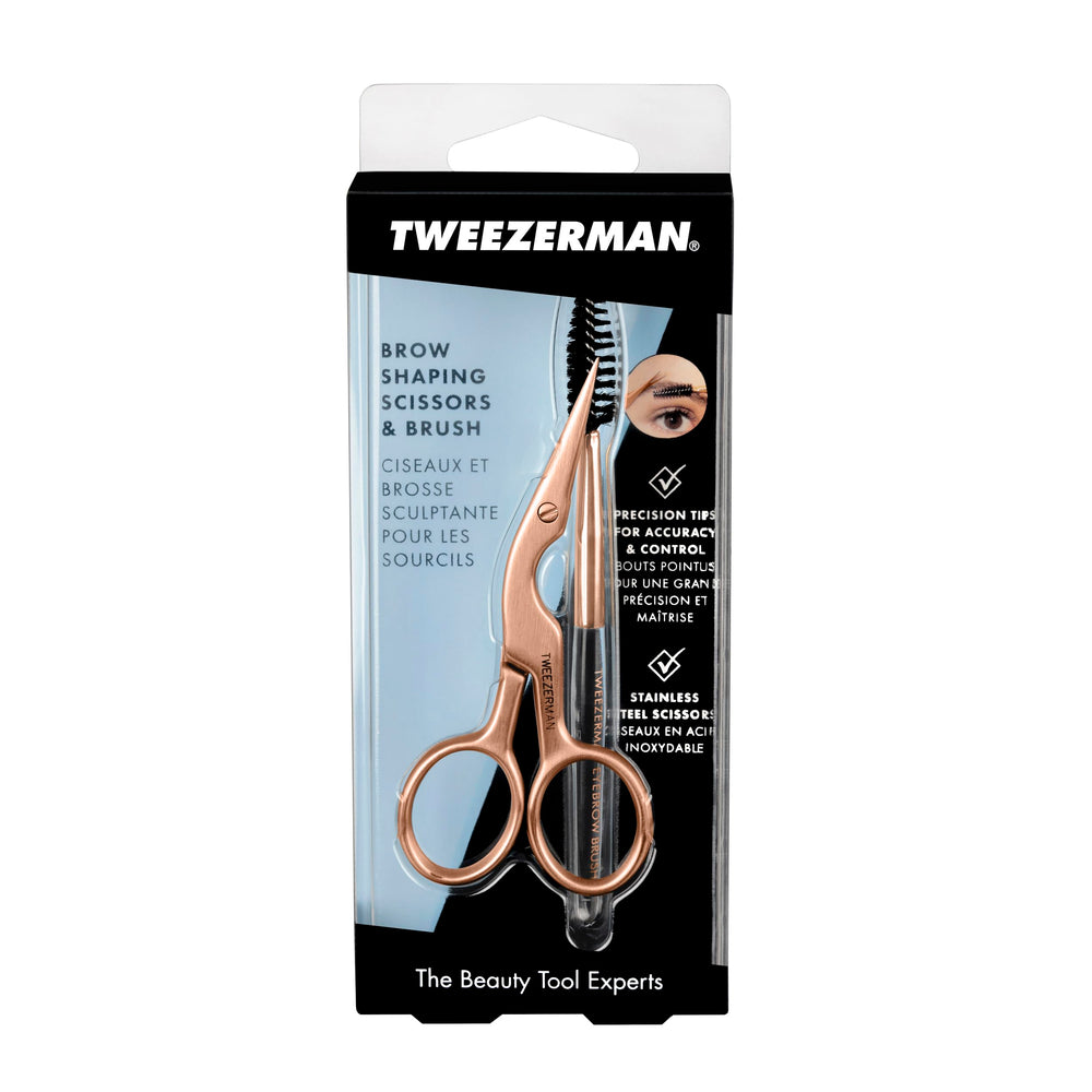 Tweezerman size comparison with coin demonstrating travel-friendly compact design