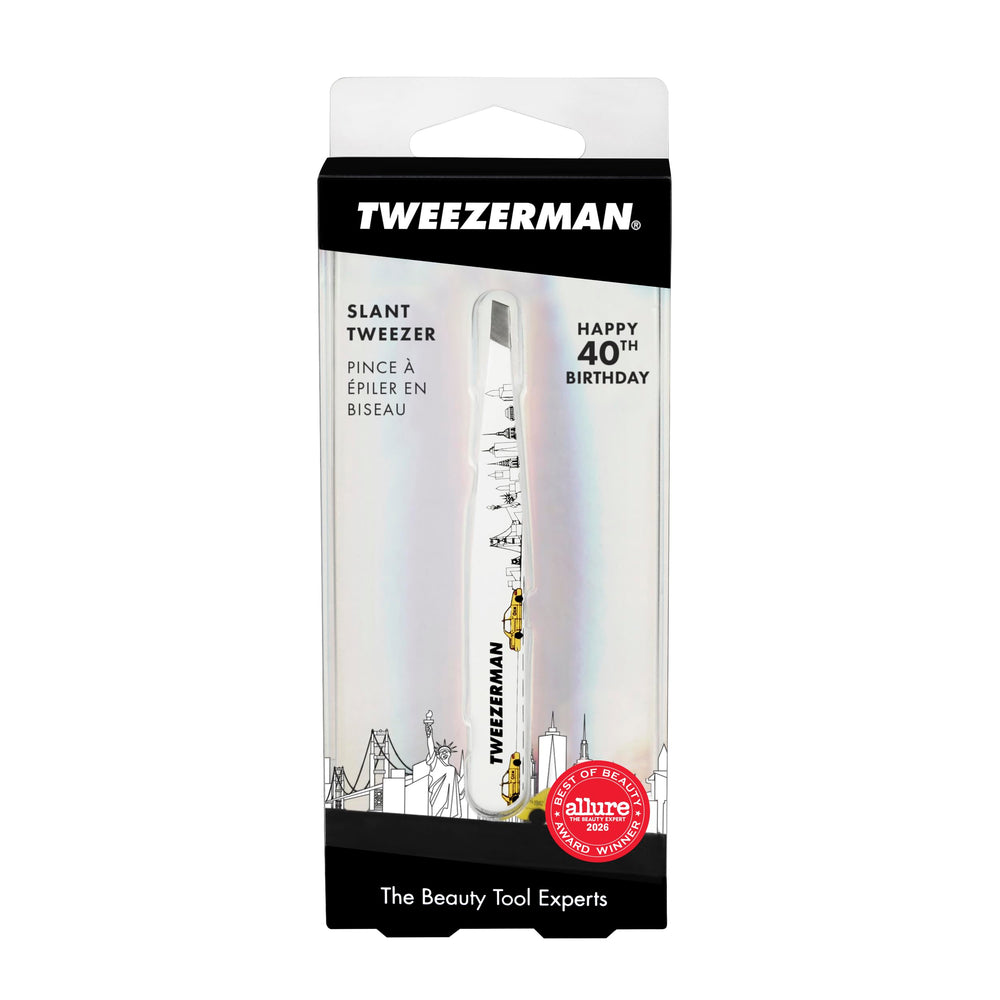 Tweezerman on a vanity styled with makeup, highlighting professional-ready look