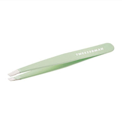 Tweezerman slant tweezer pistachio front view showing sleek shape and precision