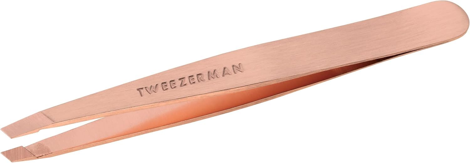 Tweezerman rose gold slant tweezer front view shows polished finish and ergonomic shape for precise grooming
