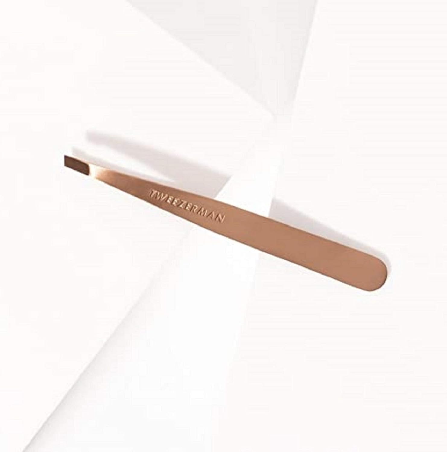 Tweezerman tweezer in branded packaging illustrating protective storage and travel-ready design