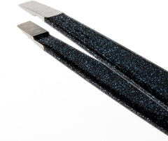 Tweezerman close-up of hand-filed slanted tips highlighting accurate hair grip