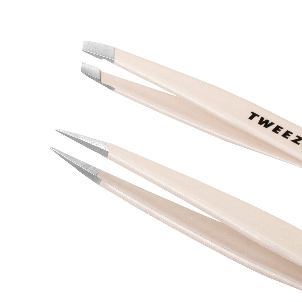 Tweezerman slanted tip closeup showing precision angle for smooth brow shaping