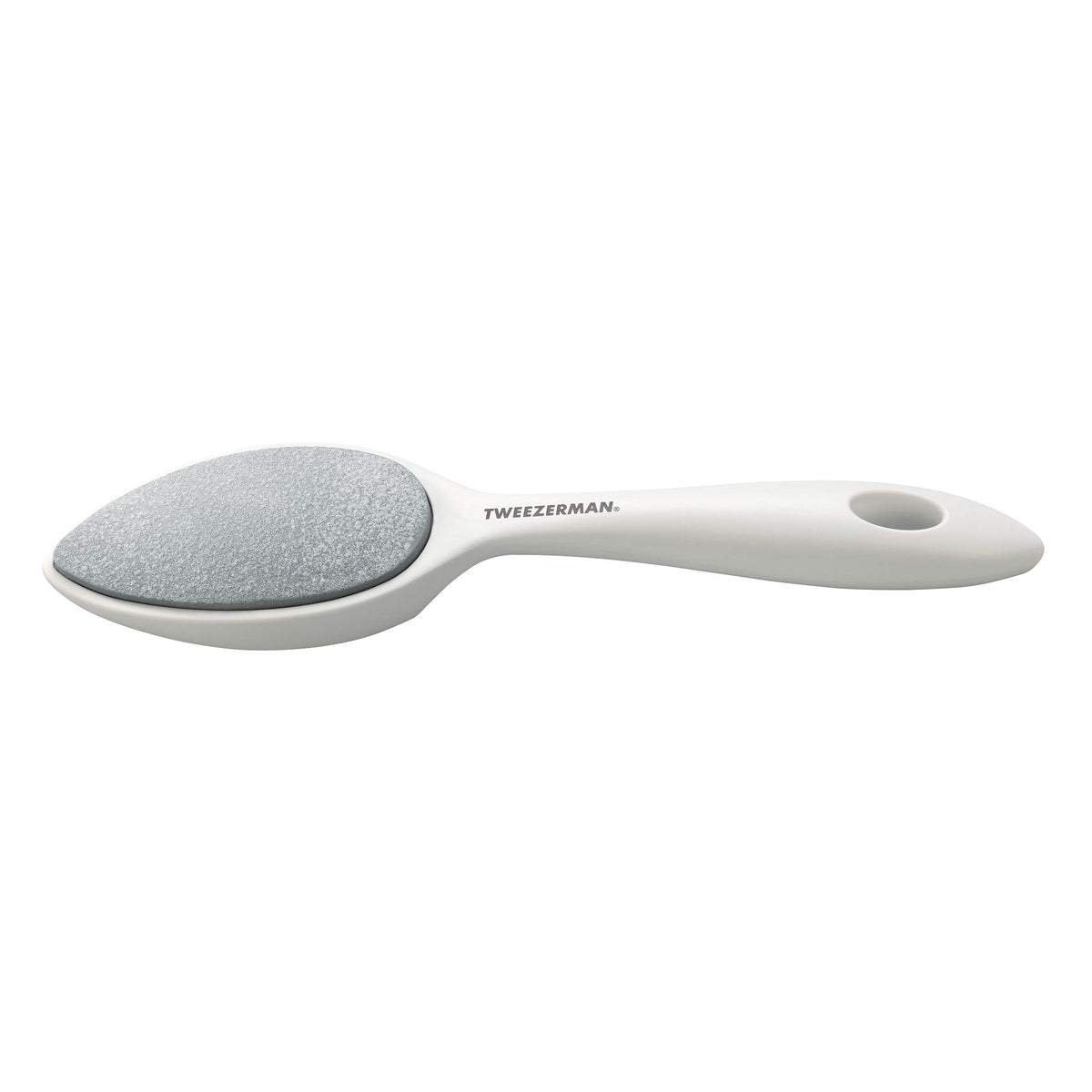 Tweezerman Sole Smoother front view showing ergonomic grip and white ceramic