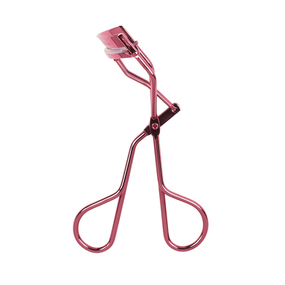 Tweezerman tea rose curler open position demonstrating ergonomic handles and smooth action