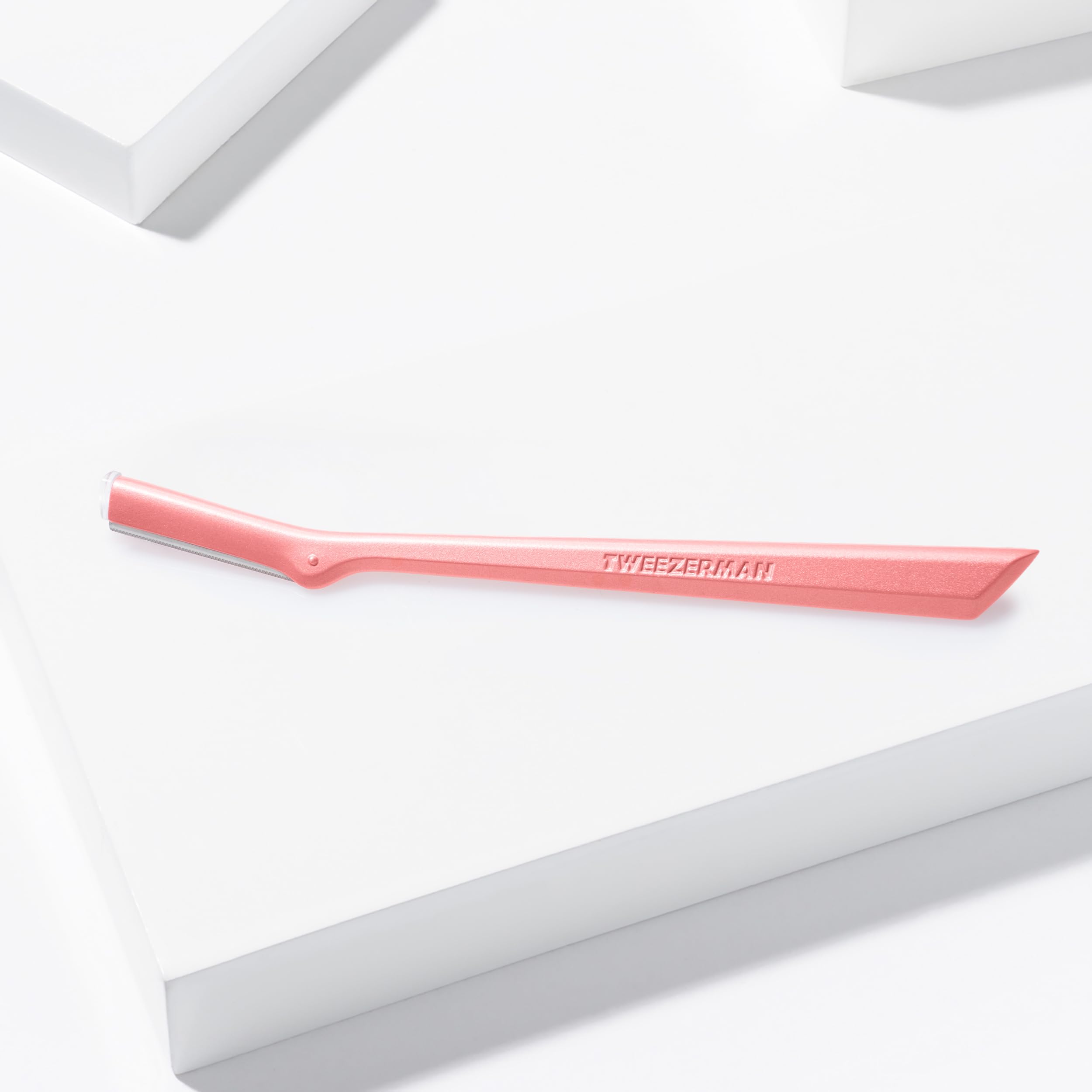 Tweezerman razor stainless-steel handle detail indicating lasting quality