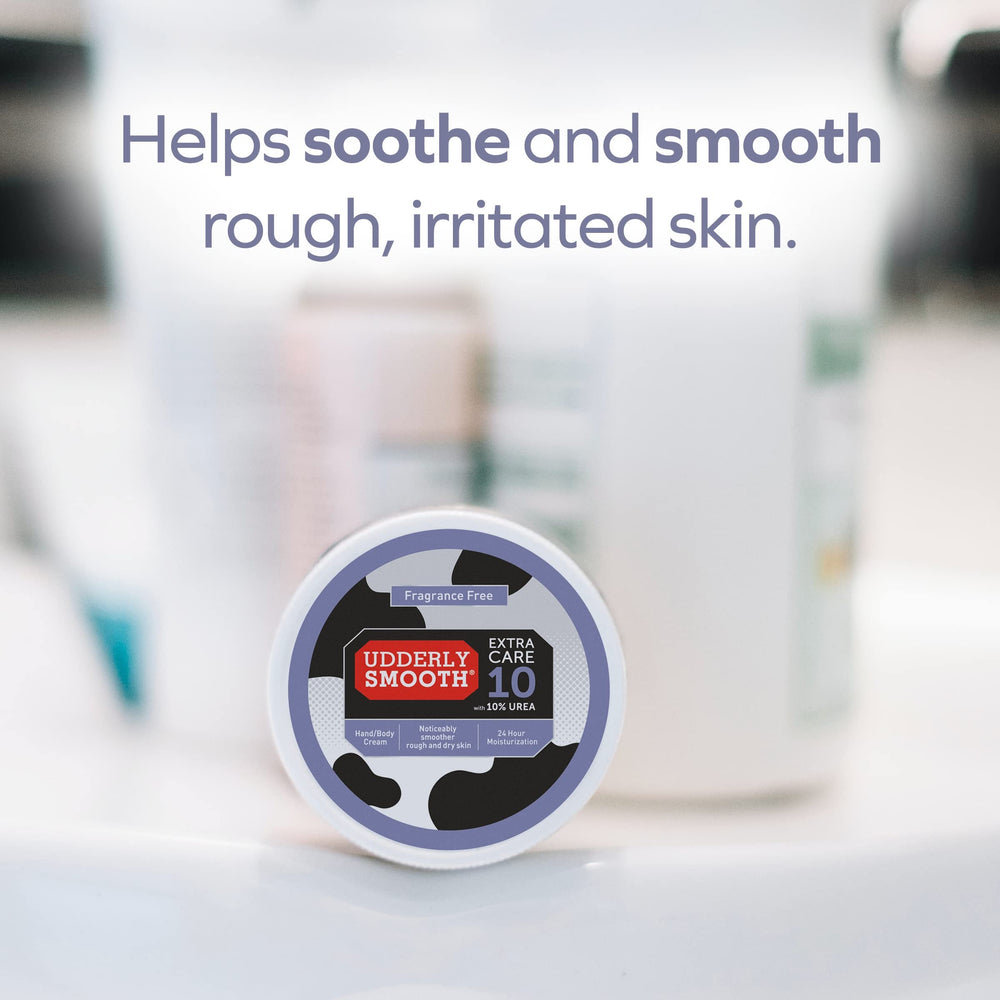 Applying Udderly Smooth to hands for softening rough skin and comfort