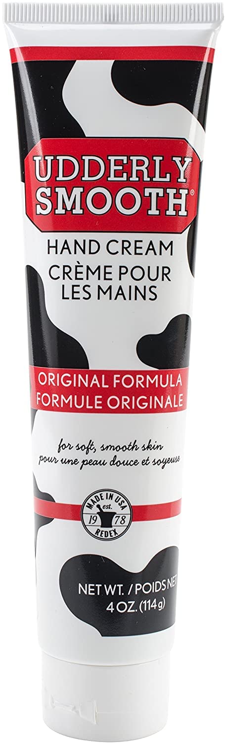 UDDERLY SMOOTH tube beside ruler showing 4 oz size benefit