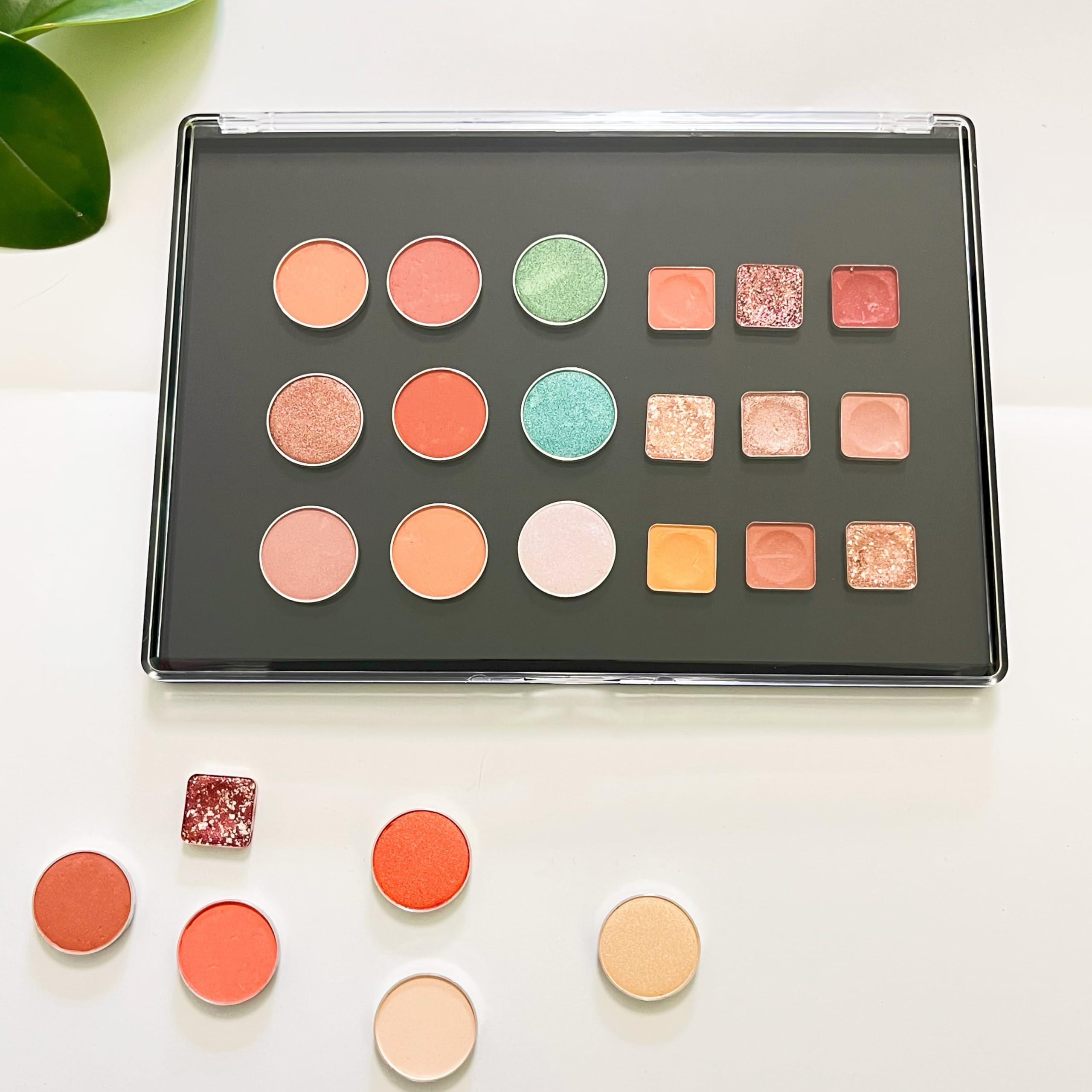 UDTIP palette size comparison with hand to show portable XL capacity