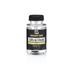 Ultra Ultrahold close-up of brush applicator applying adhesive for controlled, mess-free use