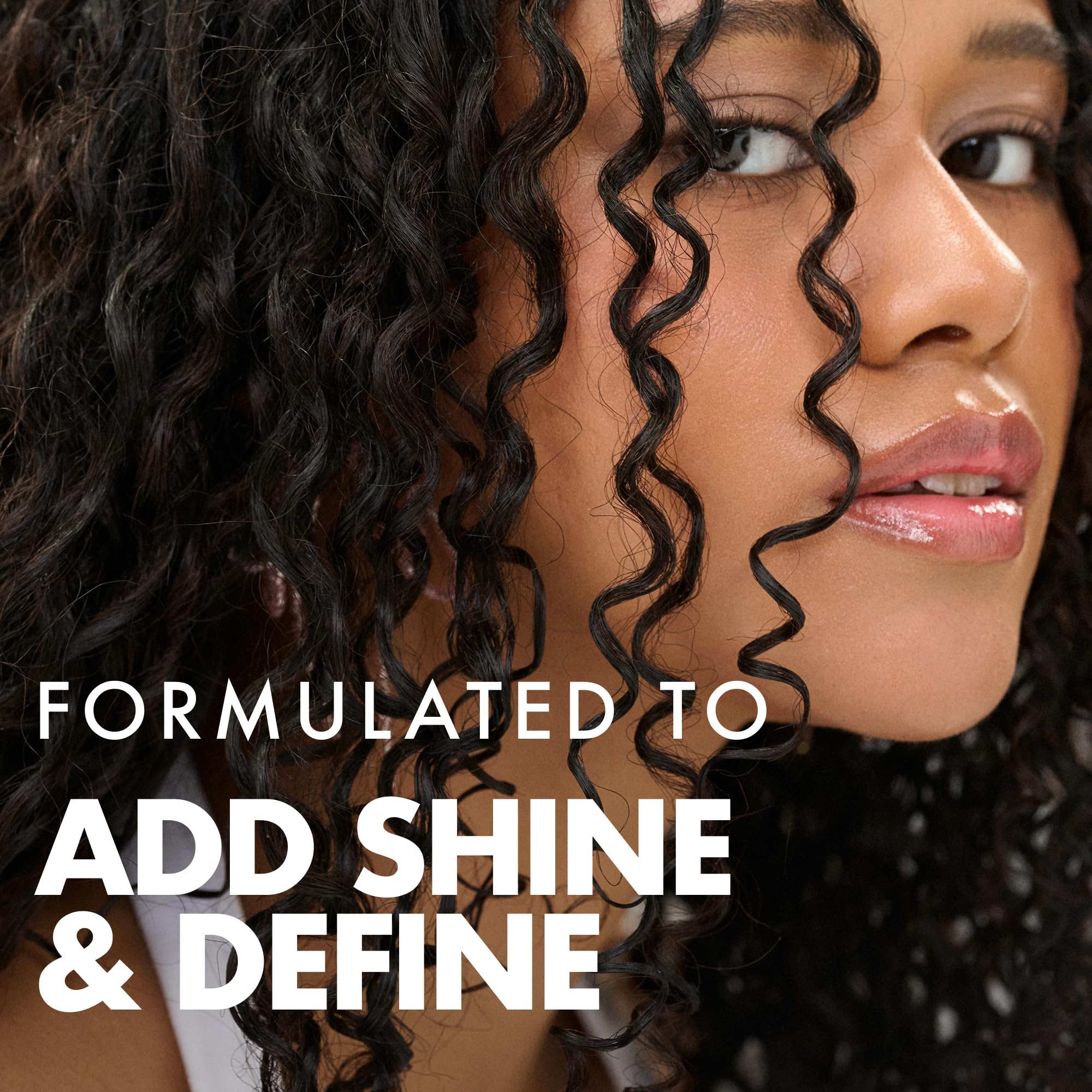 Umberto Giannini applied on wet curls demonstrating clumping and definition