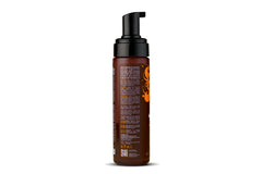 Uncle Funky's Daughter mousse foam in hand demonstrating lightweight texture