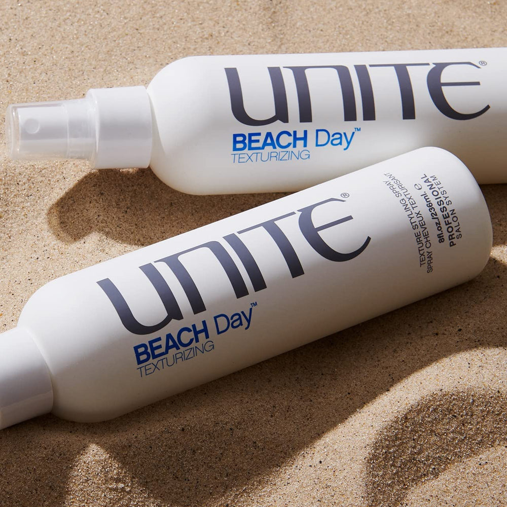 UNITE BEACH Day bottle beside sea salt and moringa illustrating protective texture