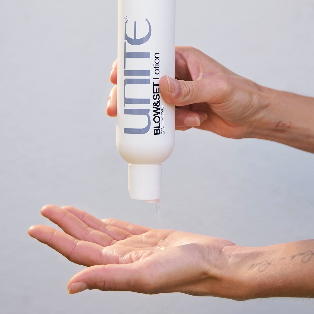 UNITE BLOW&SET used with blow-dryer illustrating heat-activated hold and volume