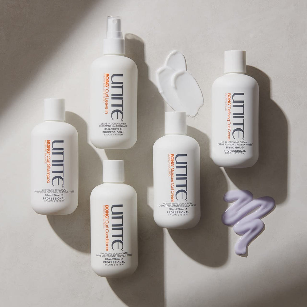 UNITE BOING shampoo displayed on bathroom shelf suggesting salon-level care