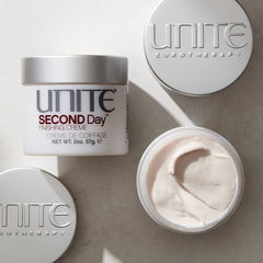 UNITE SECOND Day cream texture close-up on fingers, showing lightweight non-greasy formula