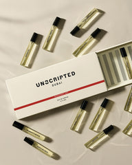 Unscripted close-up of vial labels highlighting scent names and sampling benefit