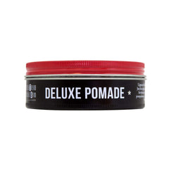 UPPERCUT DELUXE label close-up showing original barber-crafted formula details