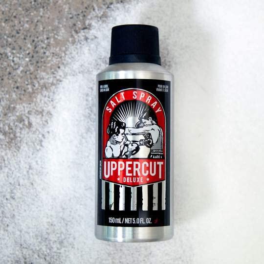 UPPERCUT DELUXE held in hand to show scale and easy portability benefit