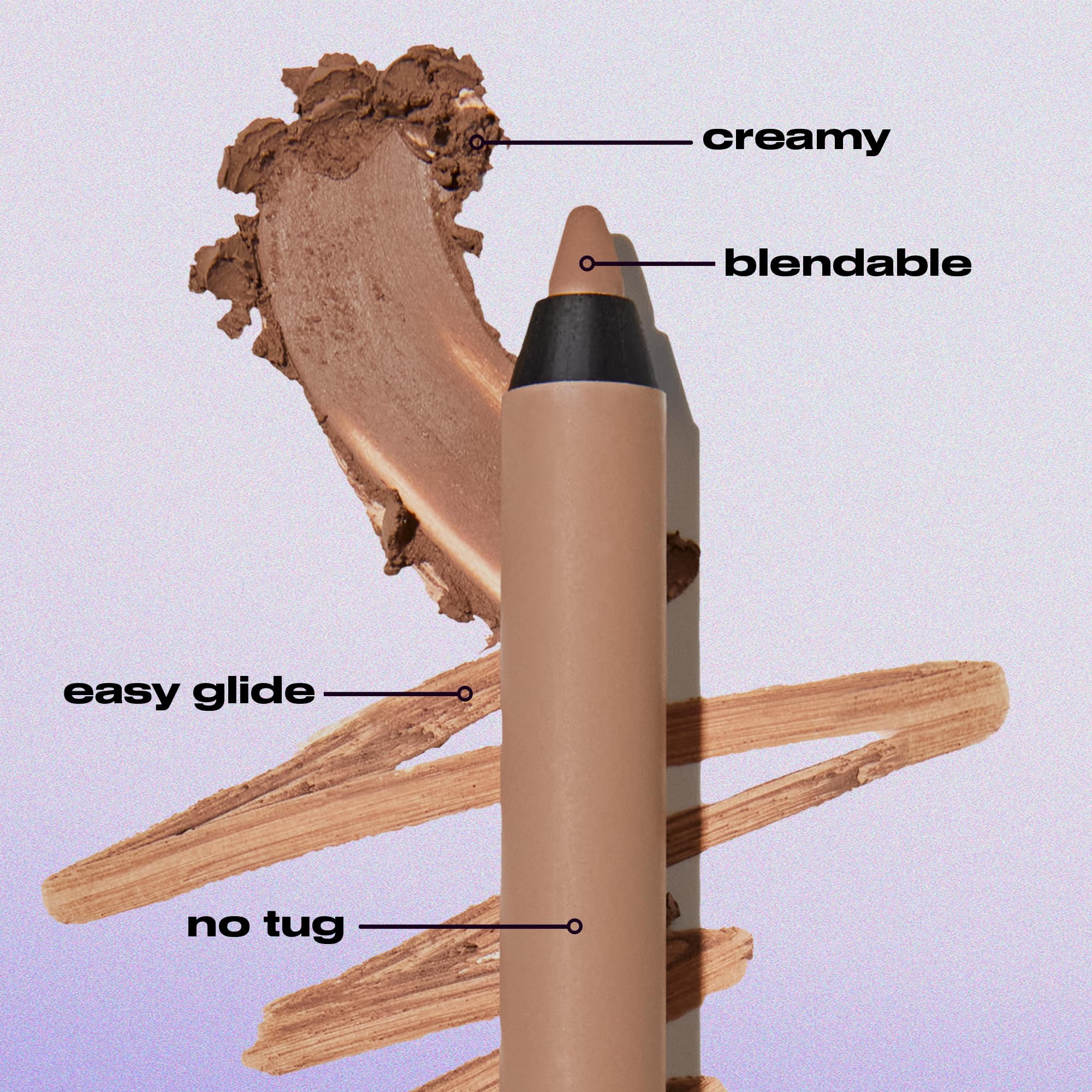 Urban Decay Chaos pencil held in hand showing scale and travel-ready convenience benefit