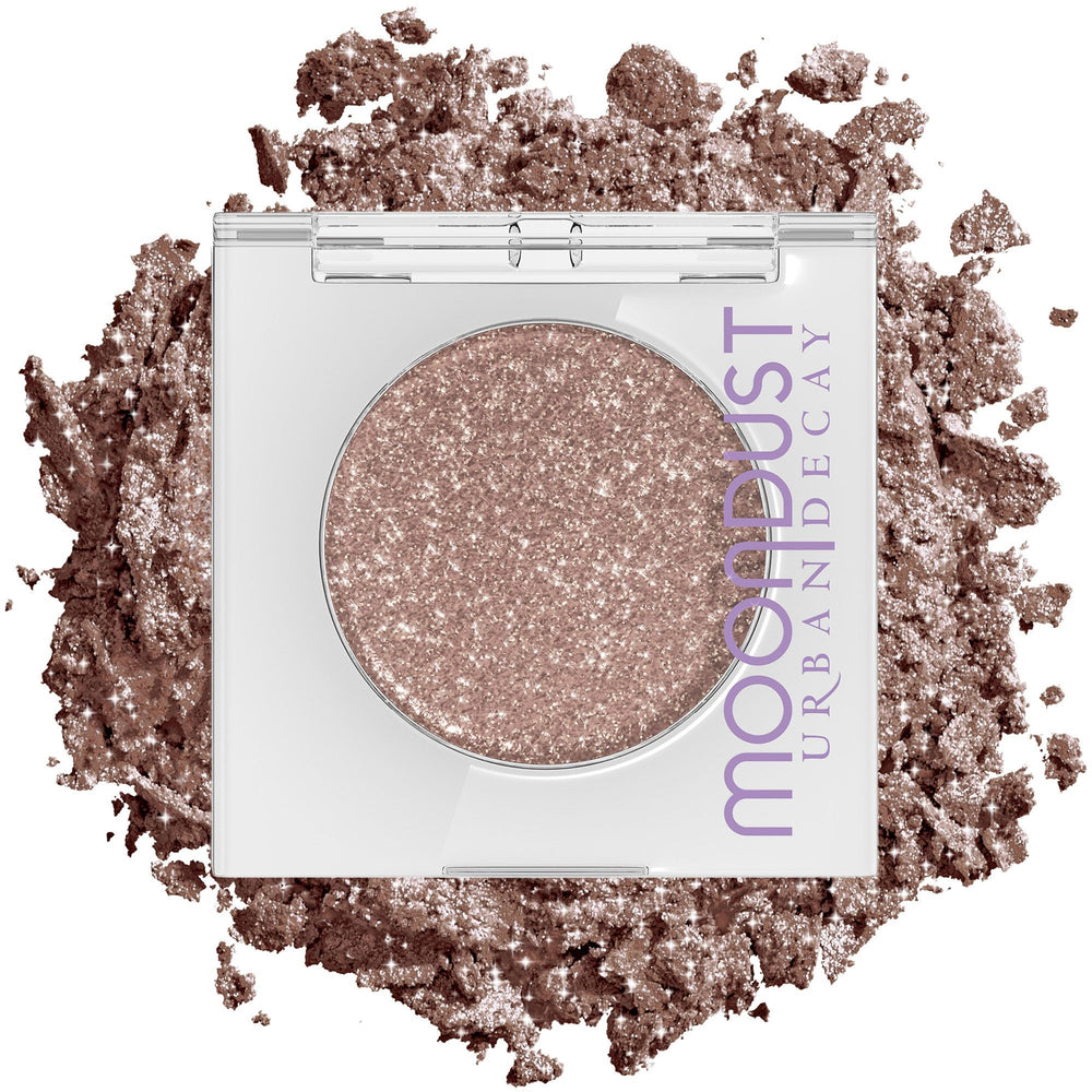Urban Decay Space Cowboy front pan showing champagne gold sparkle and easy pickup