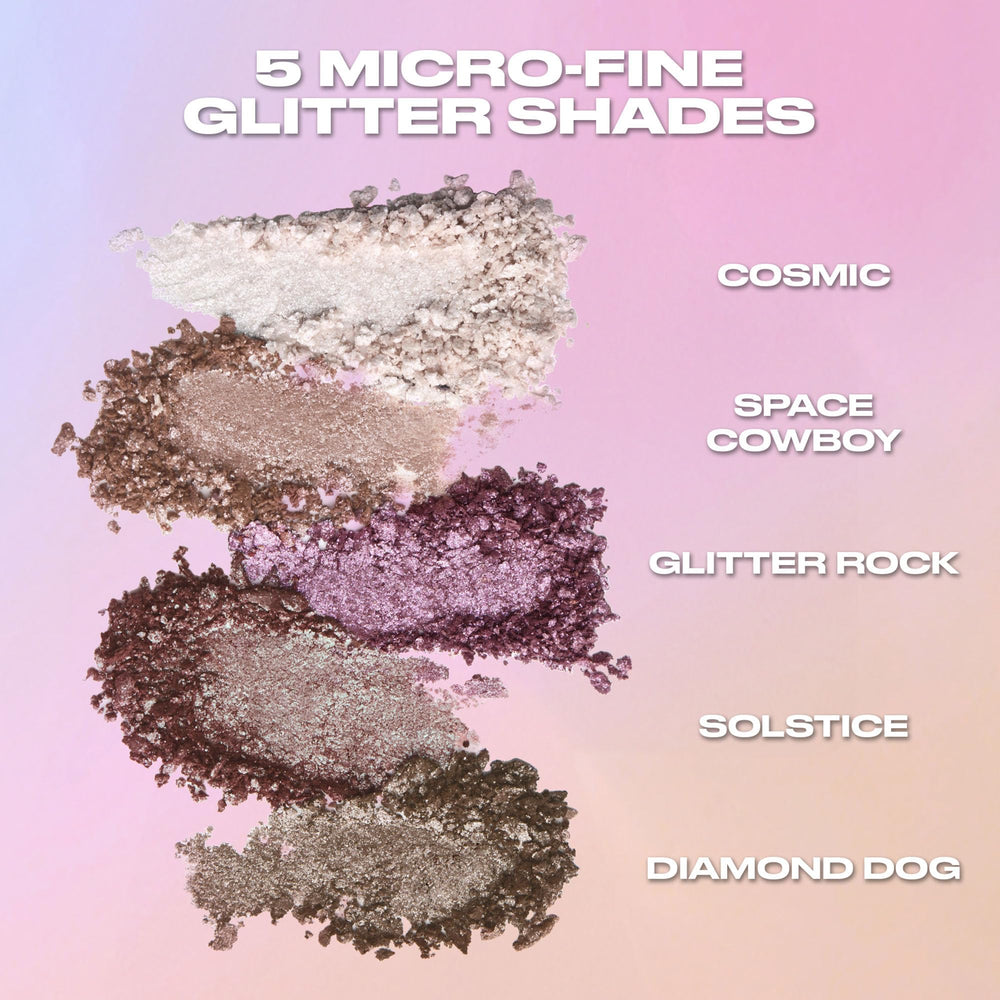 Urban Decay Space Cowboy size comparison next to brush showing compact travel-friendly form