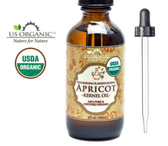 US Organic apricot kernel oil pouring to show light texture and quick absorption