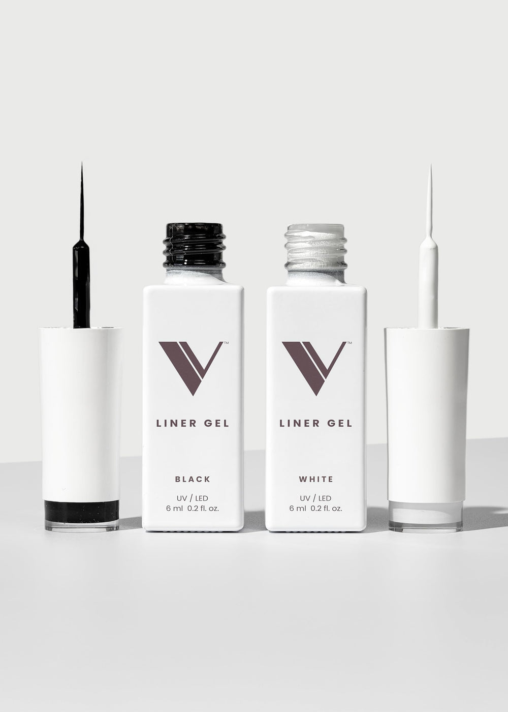 V Beauty Pure front packaging showing black and white liner bottles and benefits