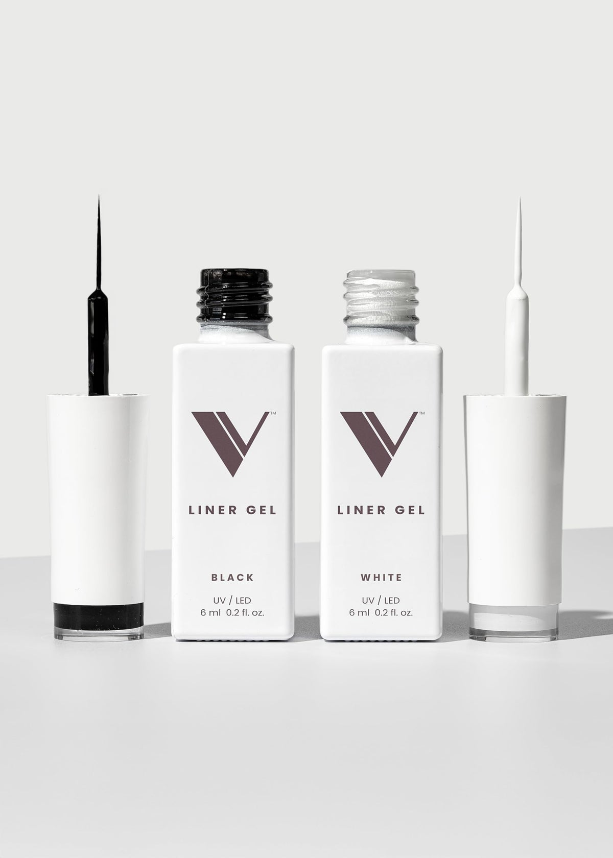 V Beauty Pure front packaging showing black and white liner bottles and benefits