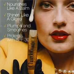 VACATION Chardonnay lip oil applied on lips delivering shine and visible plumping