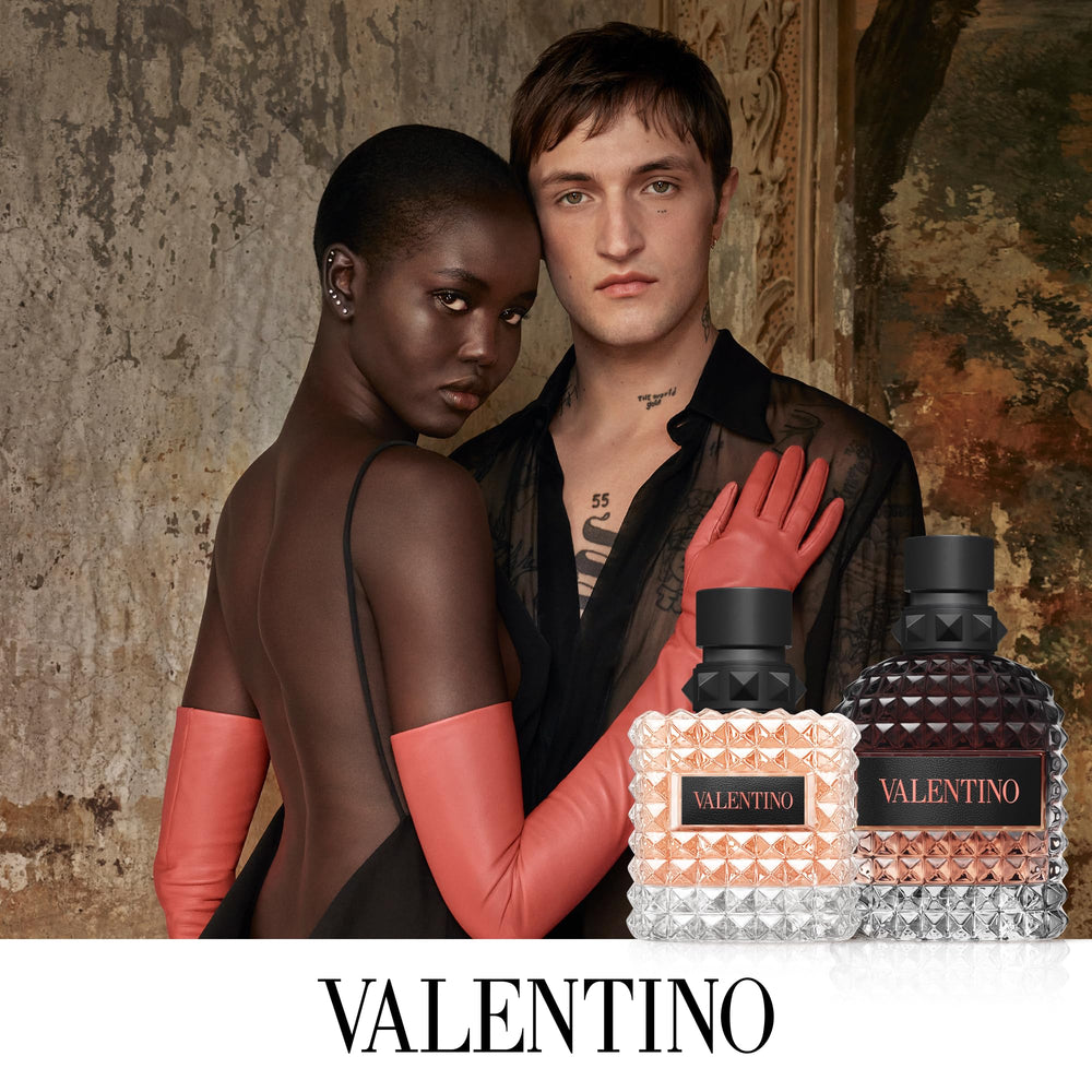 Valentino composition close-up with apple and sage suggesting fresh top notes