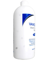 Vanicream refill being poured into pump bottle to show convenient transfer and refill savings