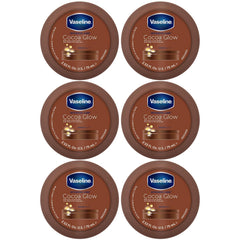 Vaseline front packaging showing six travel-size jars and cocoa scent benefit