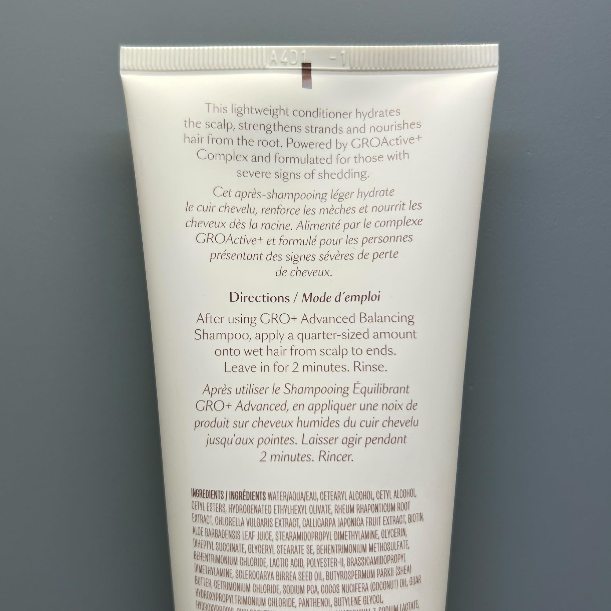 VEGAMOUR creamy conditioner texture swipe highlighting lightweight slip