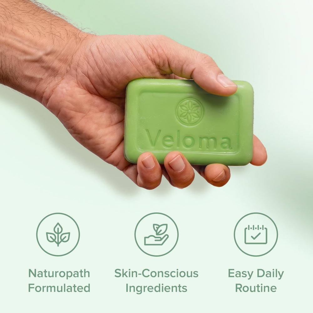 Veloma soap being used on feet in shower for refreshed feeling