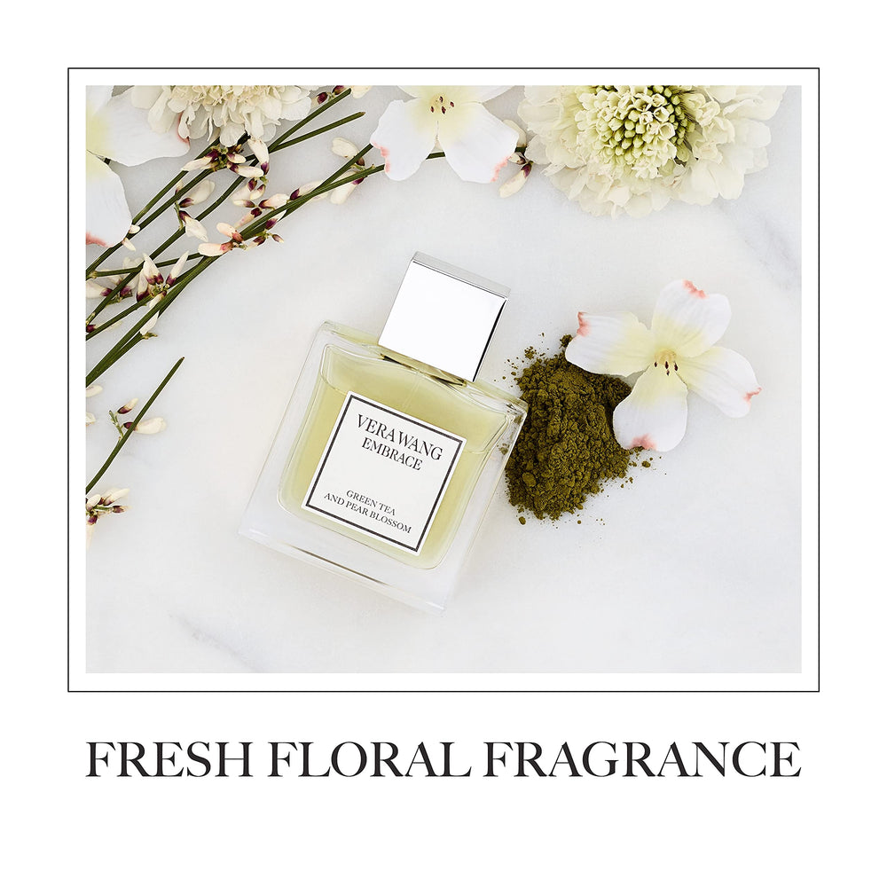 Vera Wang bottle in hand showing 1 oz scale for travel-friendly convenience