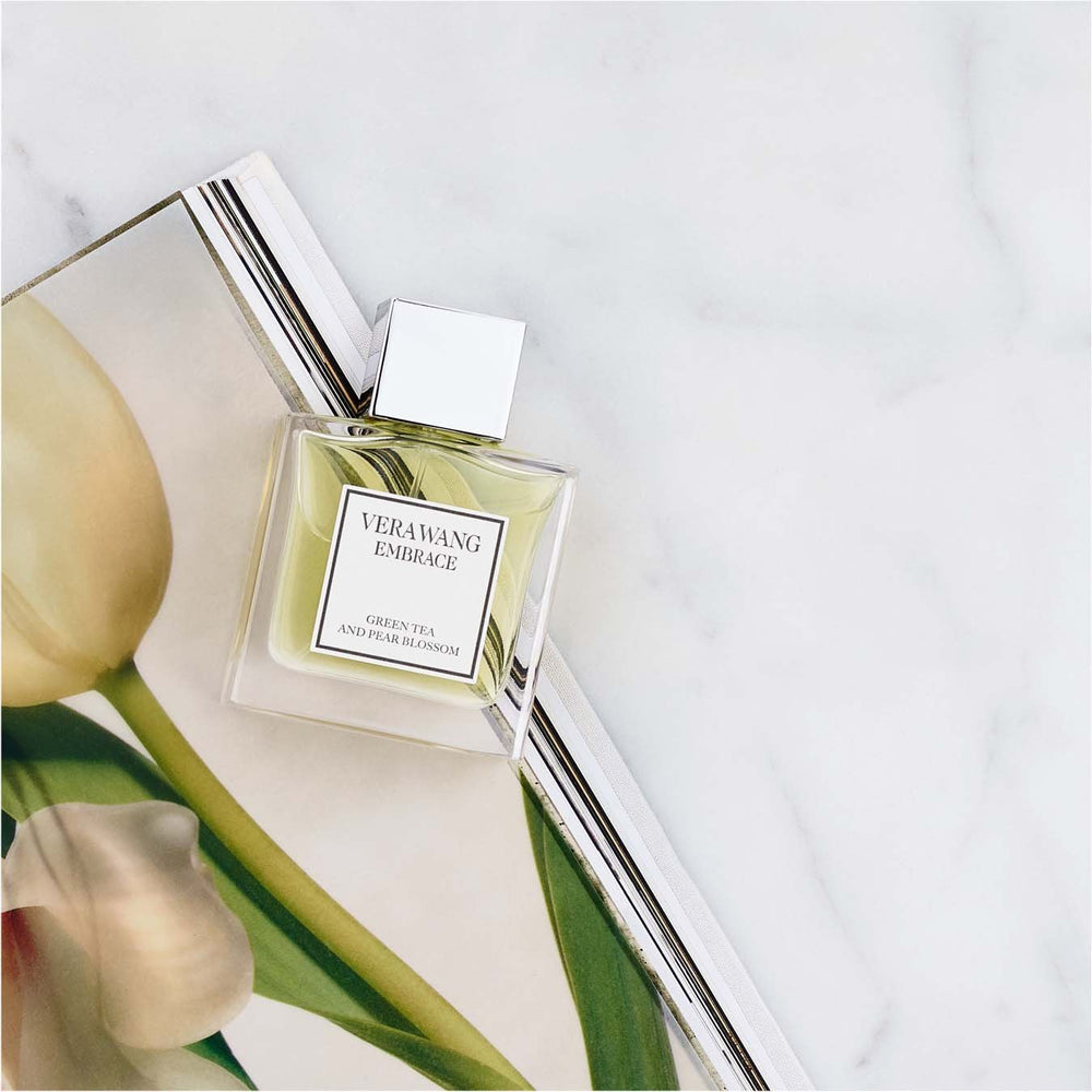 Vera Wang bottle on bathroom vanity conveying daily use and polished routine