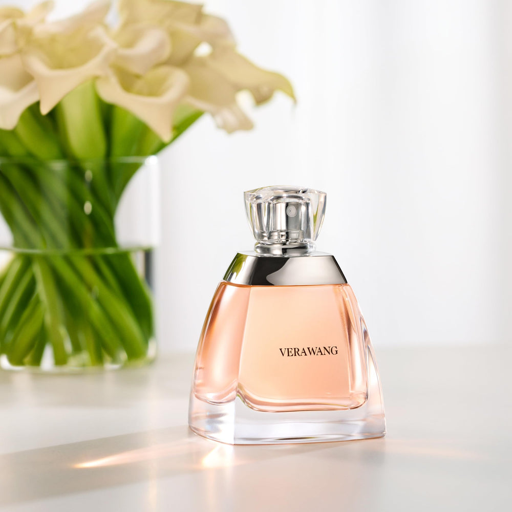 Vera Wang styled with evening wear showing a polished fragrance complement