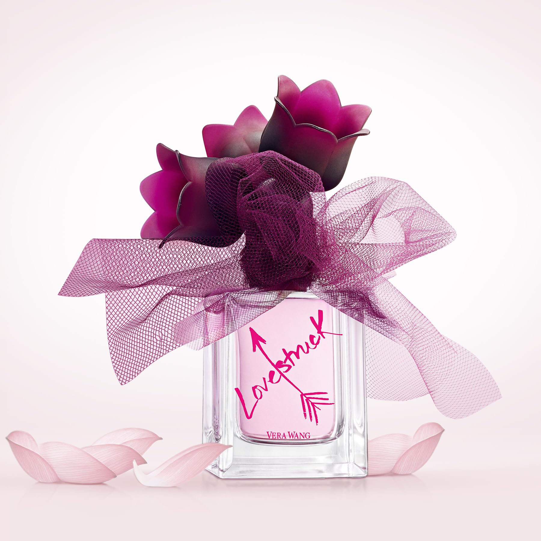 Vera Wang Love Struck being sprayed on wrist for an instant fresh boost