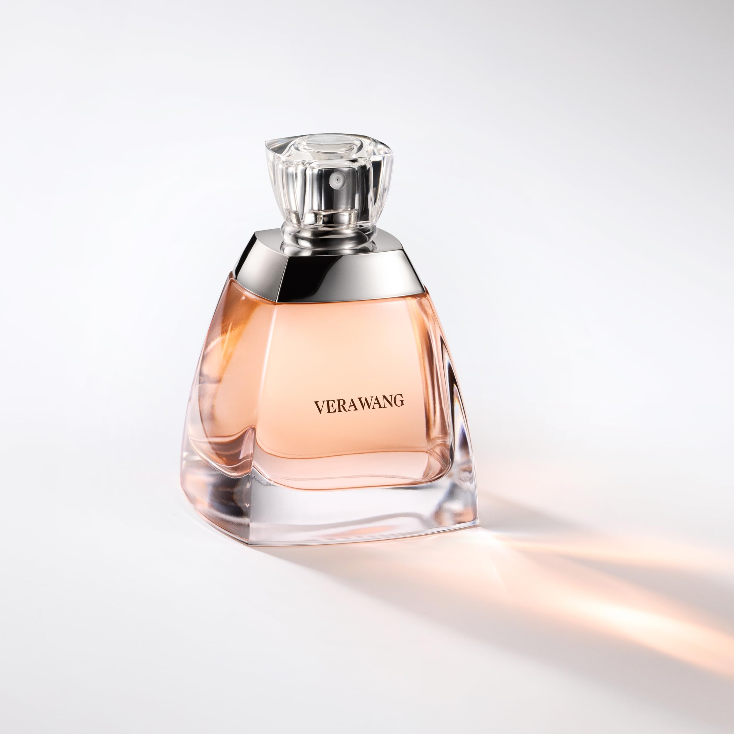Vera Wang placed on a vanity suggesting effortless evening preparation