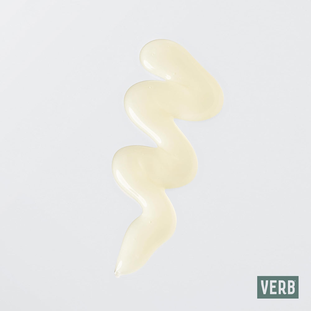 VERB curl shampoo held in hand for scale and 12 fl oz size clarity