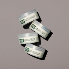 VERB forming fiber being warmed on hands for easy application and flexible styling