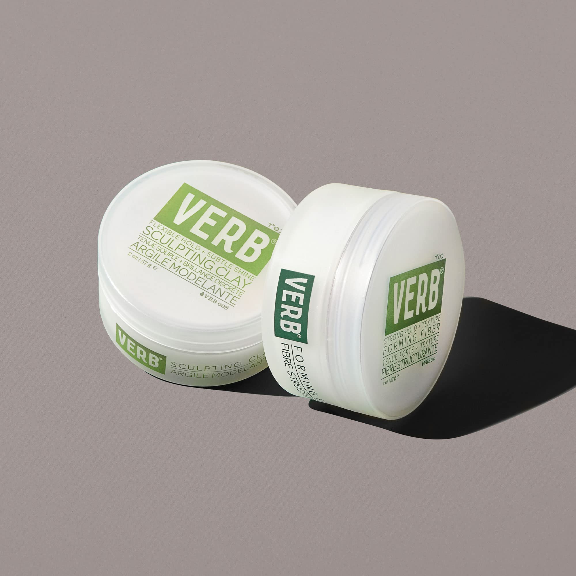 VERB sculpting clay being applied to damp hair for sleek controlled styling