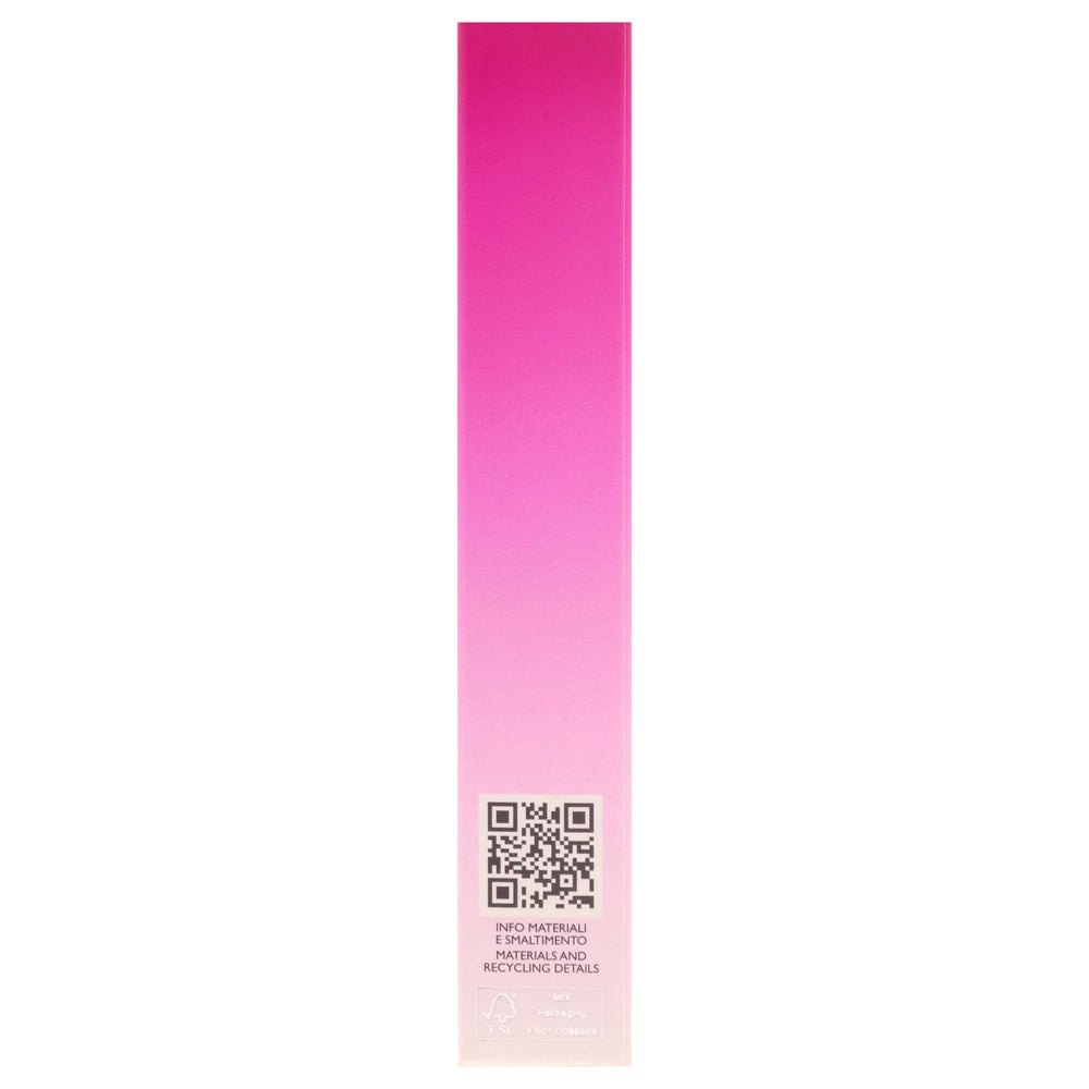 Versace Bright Crystal Absolu on vanity styled with accessories suggests elegant everyday use.