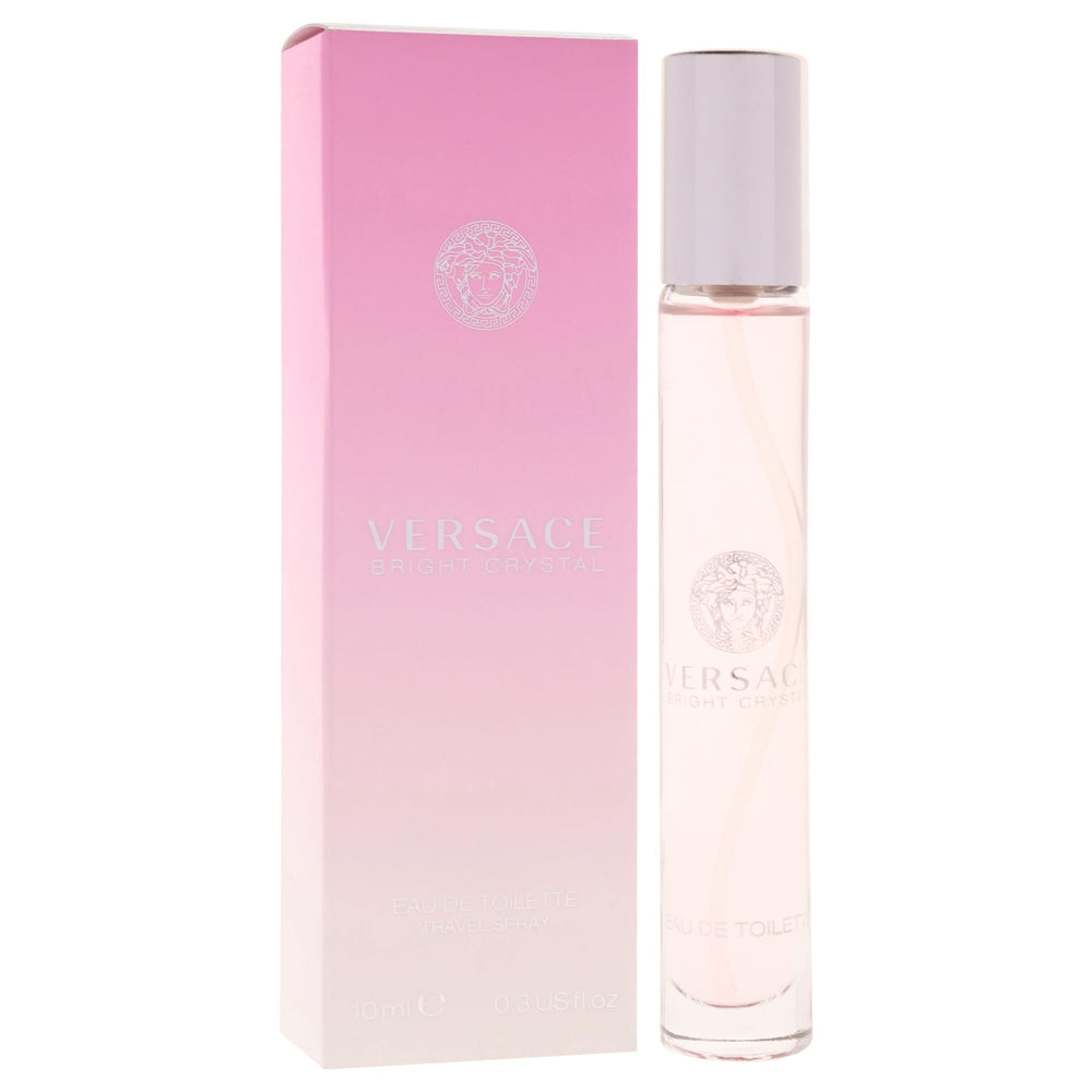 Versace Bright Crystal bottle next to coin to show compact travel-friendly size